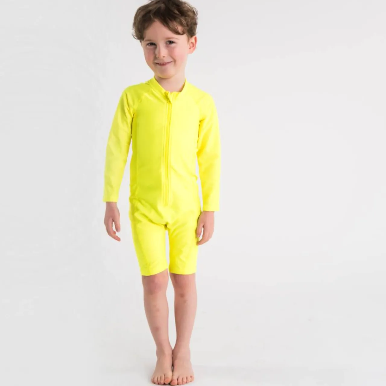 Sun & Swim*Nestling Neon by UPF50+ Shortie Swimmers - Big Kids